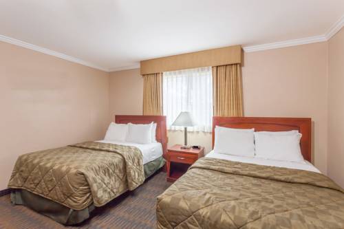 Imagen de la habitación del Hotel Days Inn & Suites By Wyndham San Diego Sdsu. Foto 9