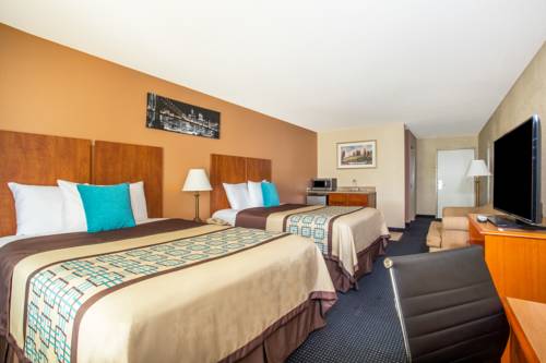 Imagen de la habitación del Hotel Days Inn & Suites By Wyndham Thibodaux. Foto 11