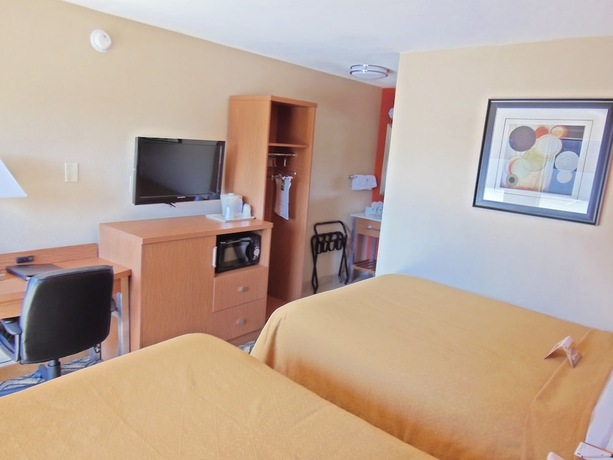 Imagen de la habitación del Hotel Days Inn and Suites By Wyndham Arlington Near Six Flags. Foto 7
