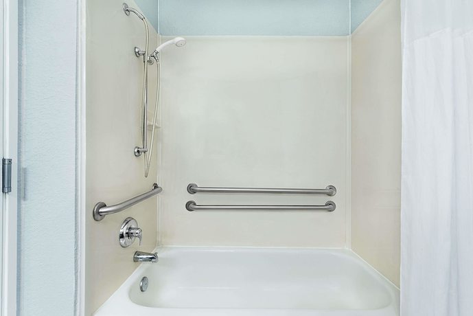 Imagen de la habitación del Hotel Days Inn and Suites By Wyndham Dallas. Foto 8