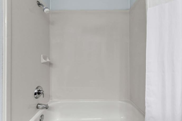 Imagen de la habitación del Hotel Days Inn and Suites By Wyndham Dallas. Foto 11