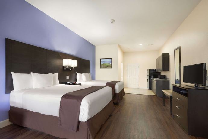 Imagen de la habitación del Hotel Days Inn and Suites By Wyndham Galveston West/seawall. Foto 3