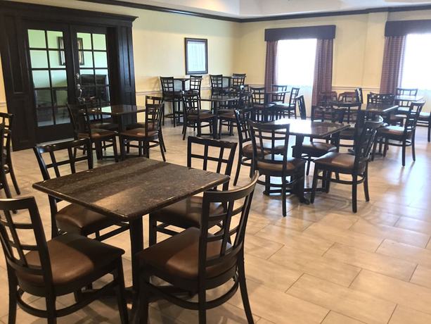 Imagen del bar/restaurante del Hotel Days Inn and Suites By Wyndham Galveston West/seawall. Foto 2