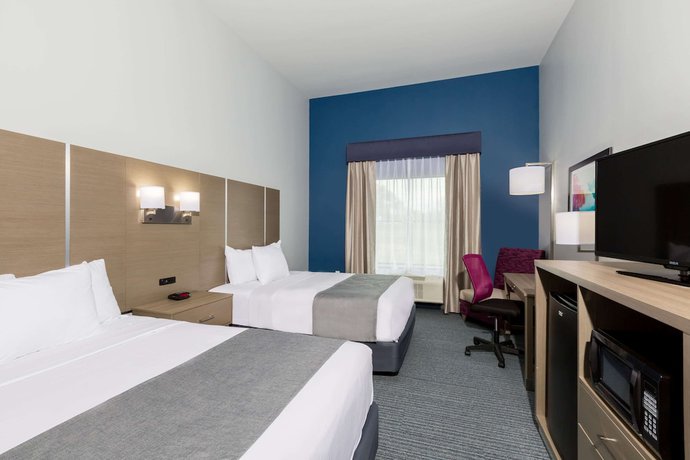 Imagen de la habitación del Hotel Days Inn and Suites By Wyndham Houston Nw Cypress. Foto 3