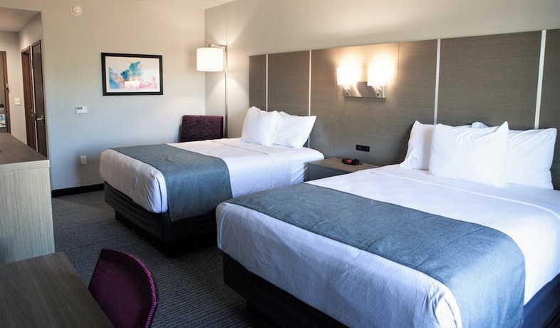 Imagen de la habitación del Hotel Days Inn and Suites By Wyndham Houston Nw Cypress. Foto 10