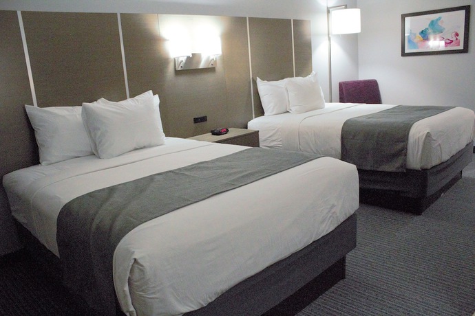 Imagen de la habitación del Hotel Days Inn and Suites By Wyndham Houston Nw Cypress. Foto 12