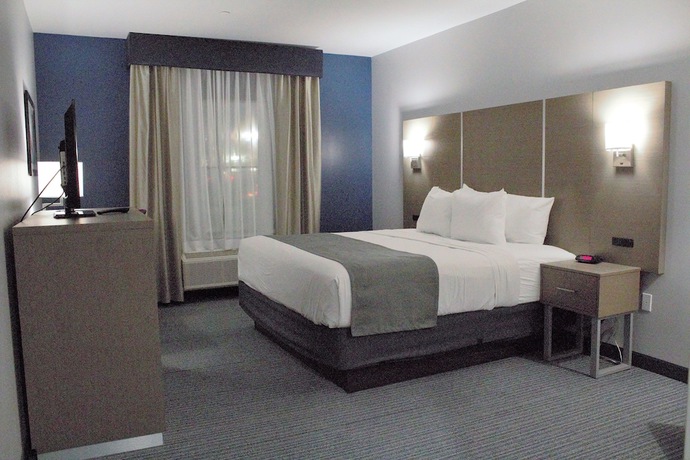 Imagen de la habitación del Hotel Days Inn and Suites By Wyndham Houston Nw Cypress. Foto 14