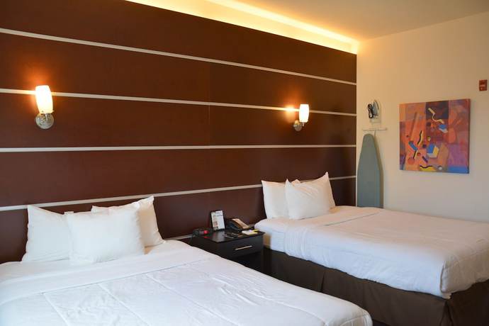 Imagen de la habitación del Hotel Days Inn and Suites By Wyndham Milwaukee. Foto 7