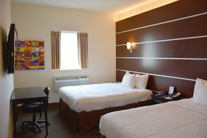 Imagen de la habitación del Hotel Days Inn and Suites By Wyndham Milwaukee. Foto 14