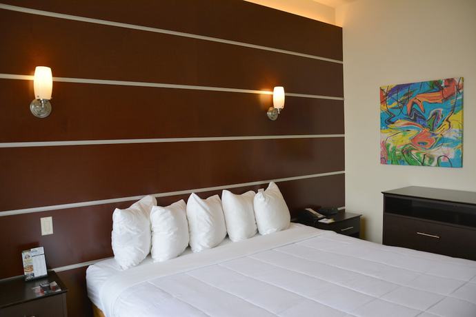 Imagen de la habitación del Hotel Days Inn and Suites By Wyndham Milwaukee. Foto 16