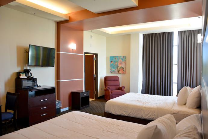 Imagen de la habitación del Hotel Days Inn and Suites By Wyndham Milwaukee. Foto 19