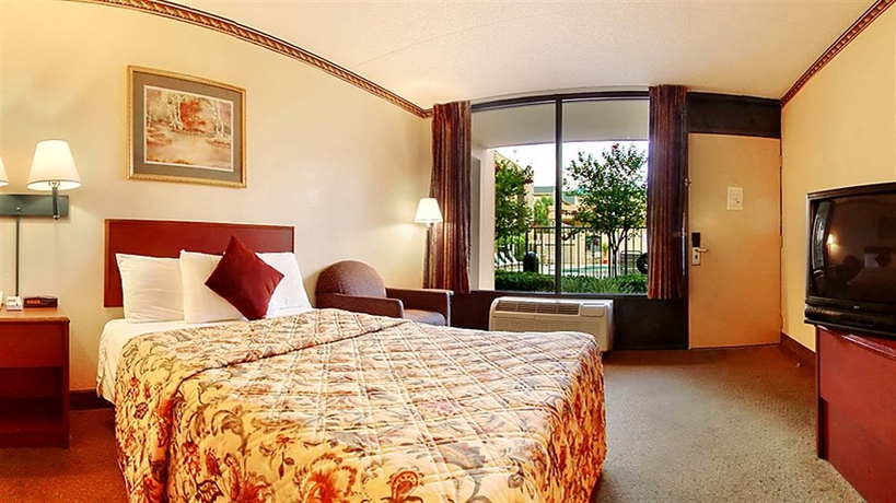 Imagen de la habitación del Hotel Days Inn and Suites By Wyndham Orlando Airport. Foto 5