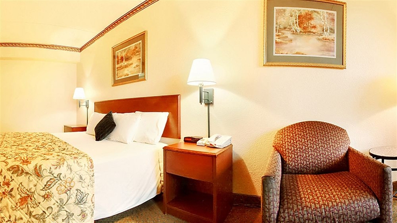 Imagen de la habitación del Hotel Days Inn and Suites By Wyndham Orlando Airport. Foto 6