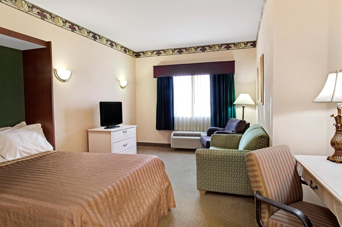 Imagen de la habitación del Hotel Days Inn and Suites By Wyndham Orlando Airport. Foto 7