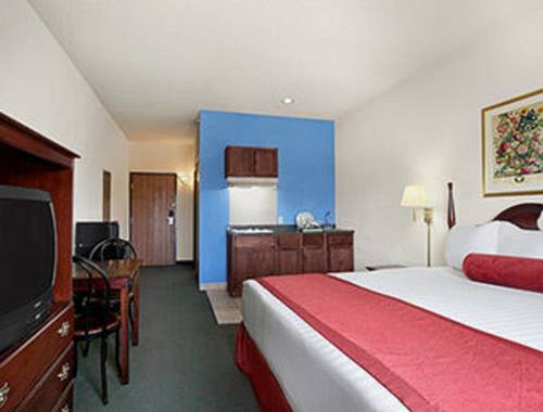 Imagen de la habitación del Hotel Days Inn and Suites By Wyndham Romeoville. Foto 3