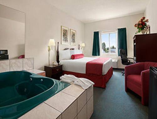Imagen de la habitación del Hotel Days Inn and Suites By Wyndham Romeoville. Foto 6