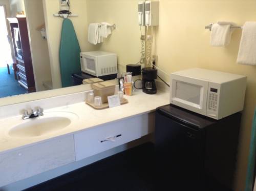 Imagen de la habitación del Hotel Days Inn and Suites By Wyndham Tucker/northlake. Foto 3