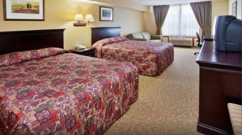 Imagen de la habitación del Hotel Days Inn and Suites By Wyndham Tucker/northlake. Foto 5