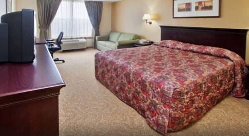 Imagen de la habitación del Hotel Days Inn and Suites By Wyndham Tucker/northlake. Foto 9