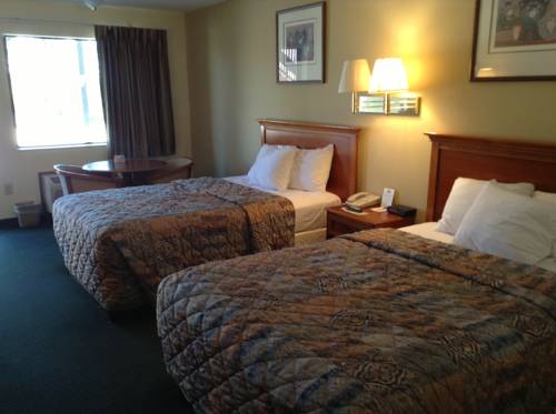 Imagen de la habitación del Hotel Days Inn and Suites By Wyndham Tucker/northlake. Foto 10