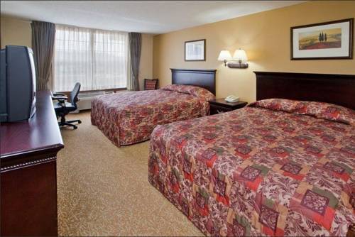 Imagen de la habitación del Hotel Days Inn and Suites By Wyndham Tucker/northlake. Foto 11