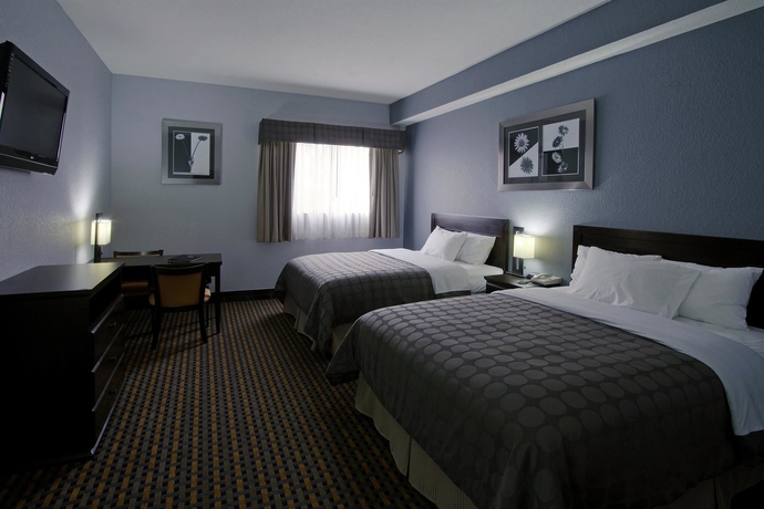 Imagen de la habitación del Hotel Days Inn and Suites by Wyndham Bonita Springs North Naples. Foto 5