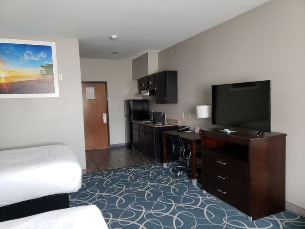 Imagen de la habitación del Hotel Days Inn and Suites by Wyndham Cleburne TX. Foto 12