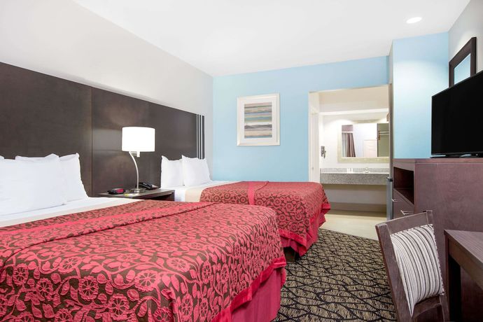 Imagen de la habitación del Hotel Days Inn and Suites by Wyndham Madisonville. Foto 8