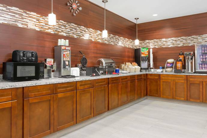Imagen del bar/restaurante del Hotel Days Inn and Suites by Wyndham Madisonville. Foto 5