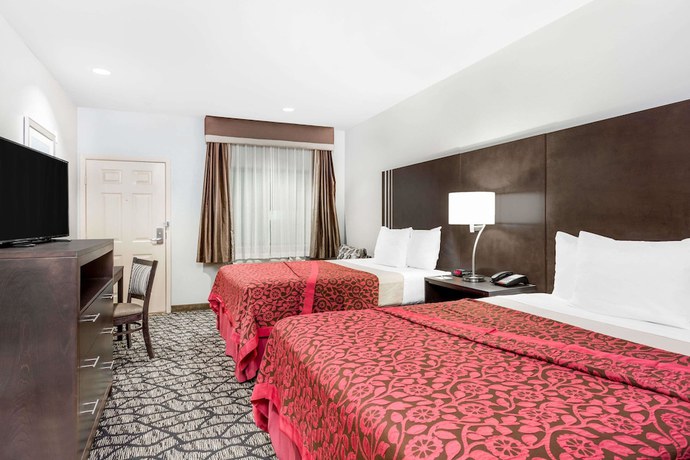 Imagen de la habitación del Hotel Days Inn and Suites by Wyndham Madisonville. Foto 13