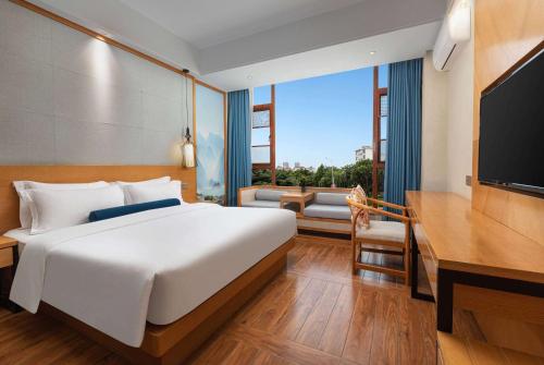 Imagen de la habitación del Hotel Days Inn by Wyndham Dali Erhai Park. Foto 12