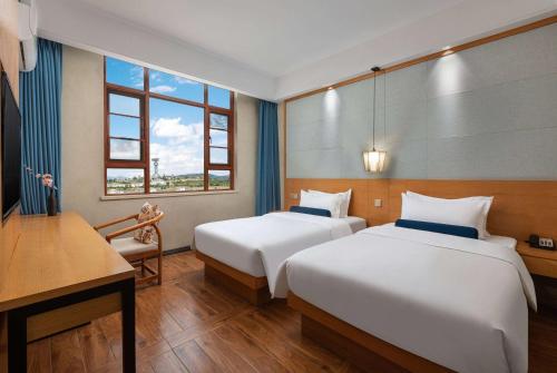 Imagen de la habitación del Hotel Days Inn by Wyndham Dali Erhai Park. Foto 13
