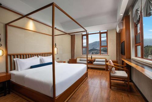 Imagen de la habitación del Hotel Days Inn by Wyndham Dali Erhai Park. Foto 14