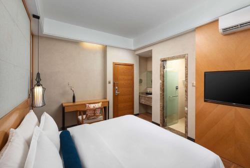 Imagen de la habitación del Hotel Days Inn by Wyndham Dali Erhai Park. Foto 16