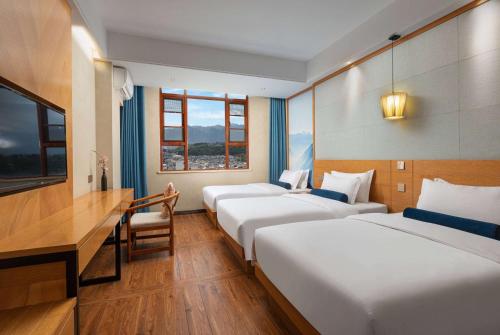 Imagen de la habitación del Hotel Days Inn by Wyndham Dali Erhai Park. Foto 17