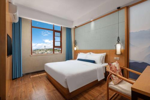 Imagen de la habitación del Hotel Days Inn by Wyndham Dali Erhai Park. Foto 18