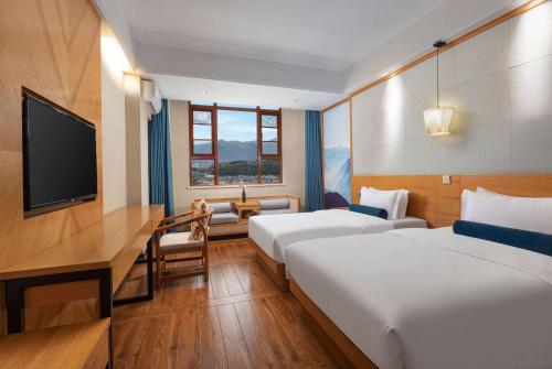 Imagen de la habitación del Hotel Days Inn by Wyndham Dali Erhai Park. Foto 19