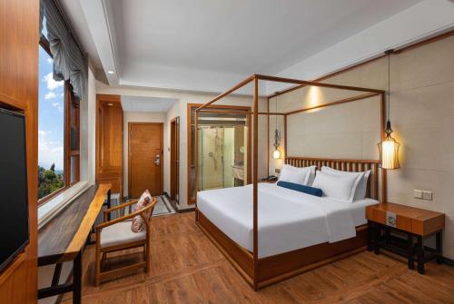Imagen de la habitación del Hotel Days Inn by Wyndham Dali Erhai Park. Foto 20