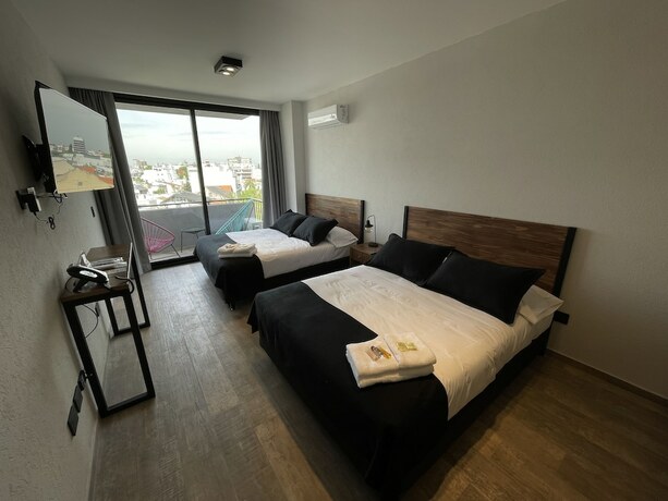 Imagen de la habitación del Hotel Days Inn by Wyndham Devoto. Foto 8