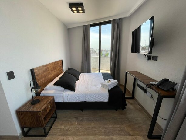 Imagen de la habitación del Hotel Days Inn by Wyndham Devoto. Foto 13