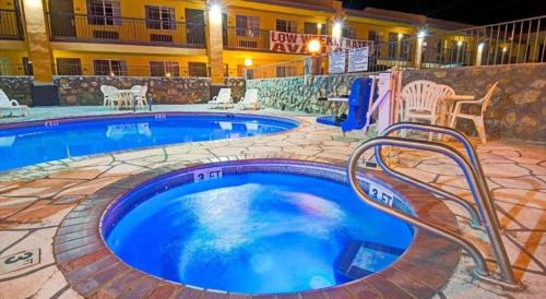 Imagen de la piscina del Hotel Days Inn by Wyndham El Paso West. Foto 17