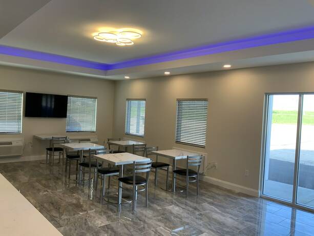 Imagen del bar/restaurante del Hotel Days Inn by Wyndham Troy IL. Foto 9