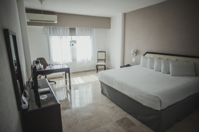 Imagen de la habitación del Hotel Days Inn by Wyndham Tuxtepec. Foto 4
