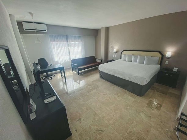 Imagen de la habitación del Hotel Days Inn by Wyndham Tuxtepec. Foto 11
