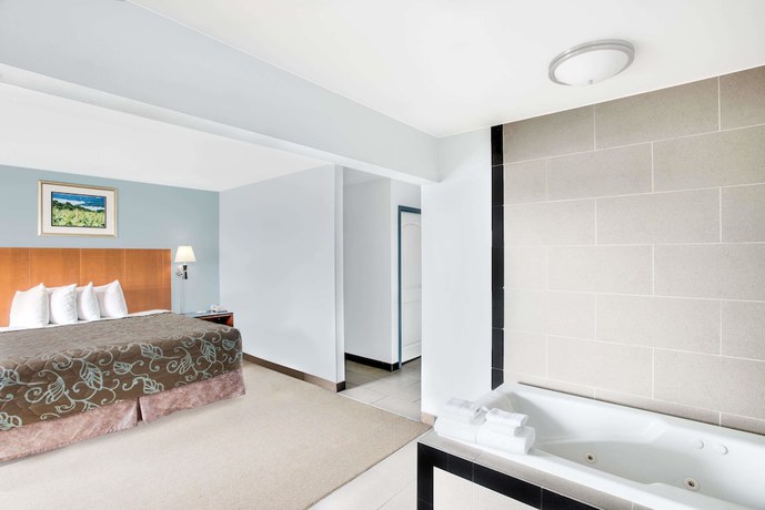 Imagen de la habitación del Hotel Days Inn by Wyndham Watertown Fort Drum. Foto 14