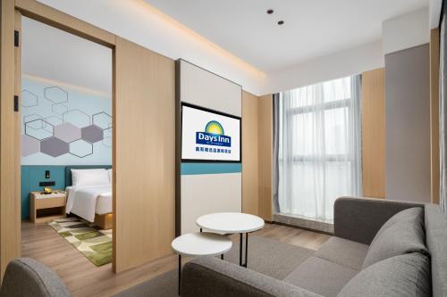Imagen de la habitación del Hotel Days Inn by Wyndham Zhuhai Gongbei Port. Foto 14