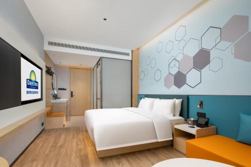 Imagen de la habitación del Hotel Days Inn by Wyndham Zhuhai Gongbei Port. Foto 17