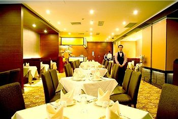 Imagen del bar/restaurante del Hotel Days Luohu. Foto 2