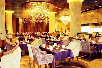 Imagen del bar/restaurante del Hotel Days Suites Yangjiang. Foto 3