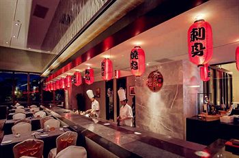 Imagen del bar/restaurante del Hotel Days Suites Yangjiang. Foto 4